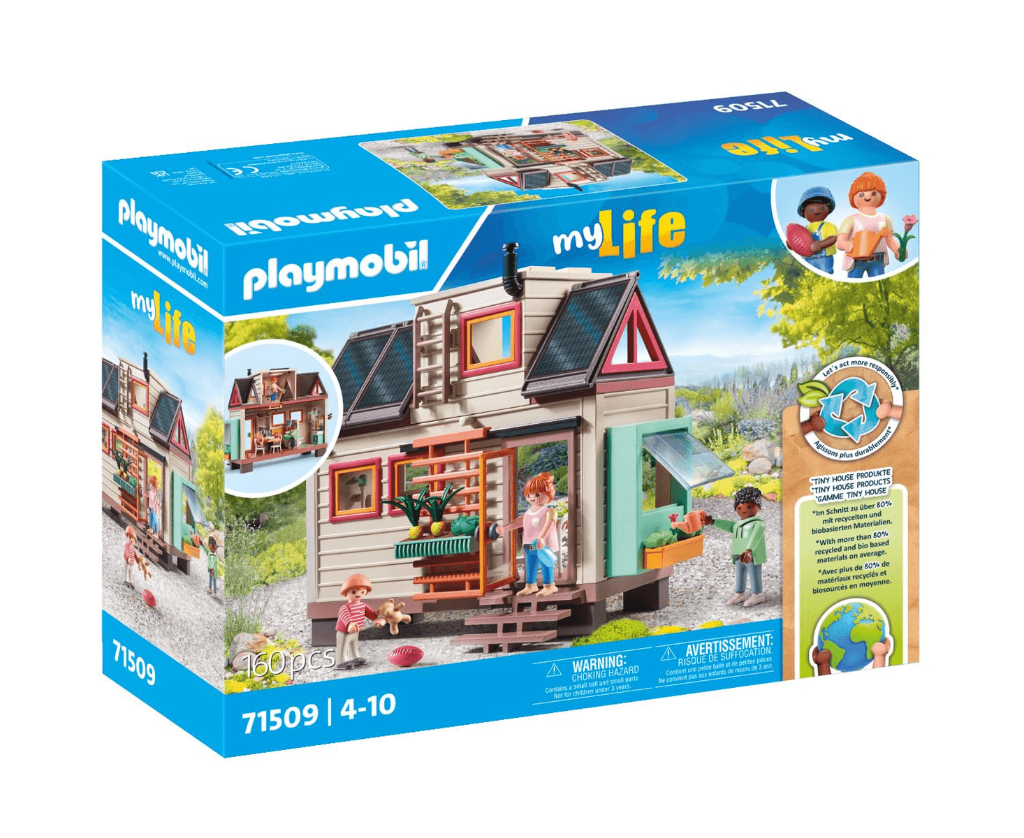 Playmobil My Life Tiny House Set-Verpackung mit Figuren und Zubehör vor naturbezogenem Hintergrund.