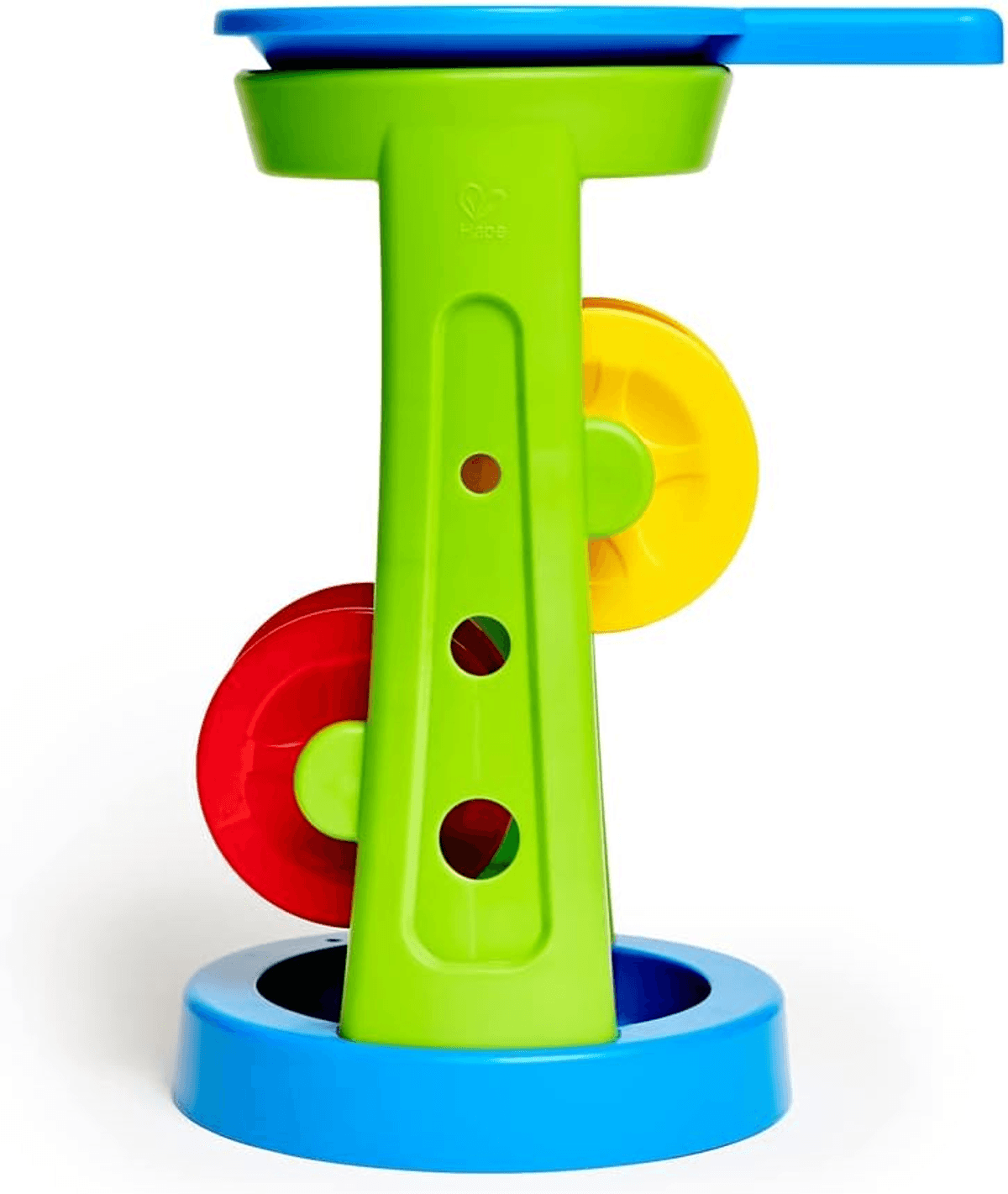 Torre de juguete de plástico colorida con pilar verde, base y parte superior azules, y ruedas rojas y amarillas sobre fondo blanco.