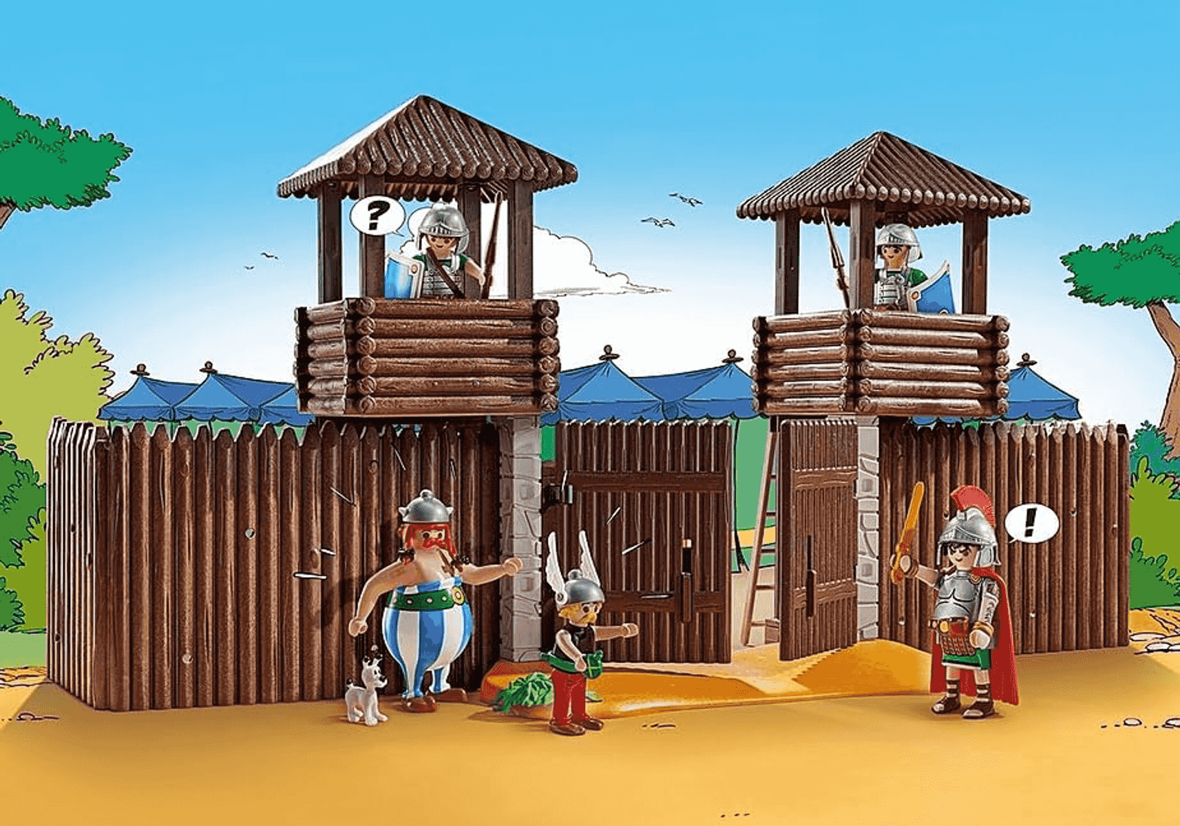 Fuerte de Playmobil con vallas de madera, torres y figuras como Astérix, Obelix y un romano.