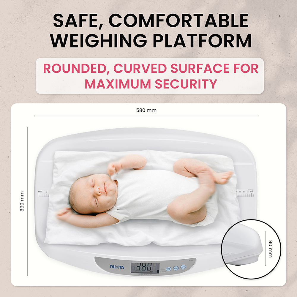 A baby lies on a white Tanita baby scale featuring a digital display and dimensions.