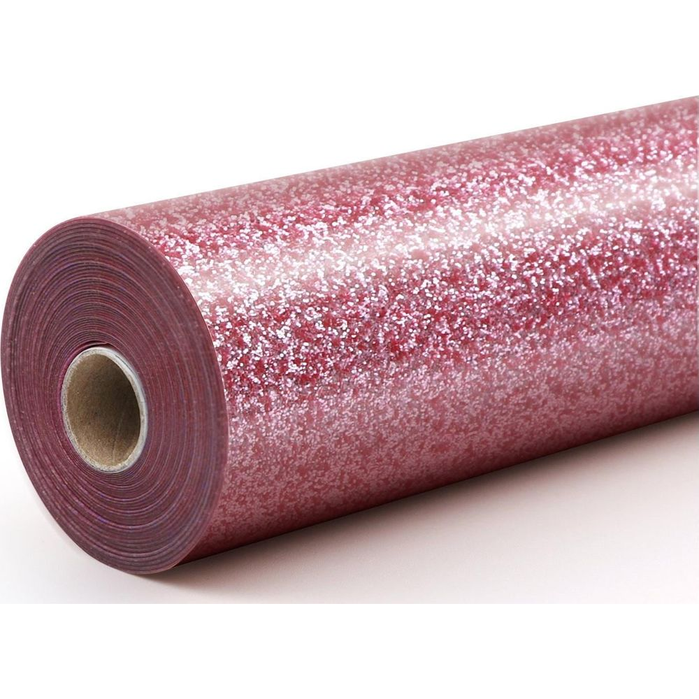 Eine Rolle pinkes Glitzer-Geschenkpapier auf weißem Grund.