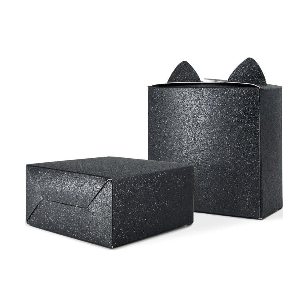Zwei schwarze Glitzerboxen, eine flache und eine hohe mit Katzenohren, stehen auf weißem Hintergrund.