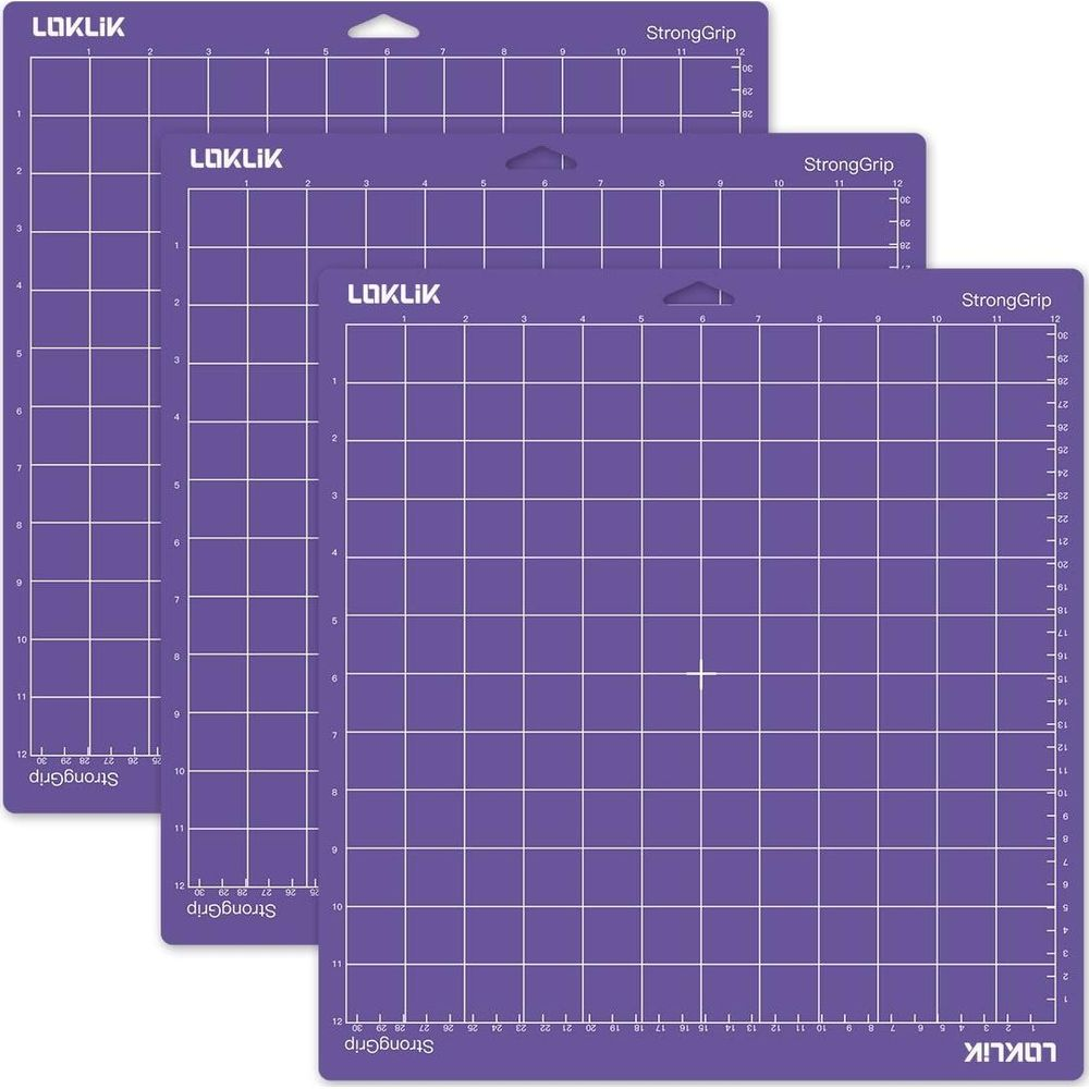 Drei lila StrongGrip Schneidematten mit weißen Rasterlinien und LOKLIK-Logos überlappen sich auf weißem Hintergrund.