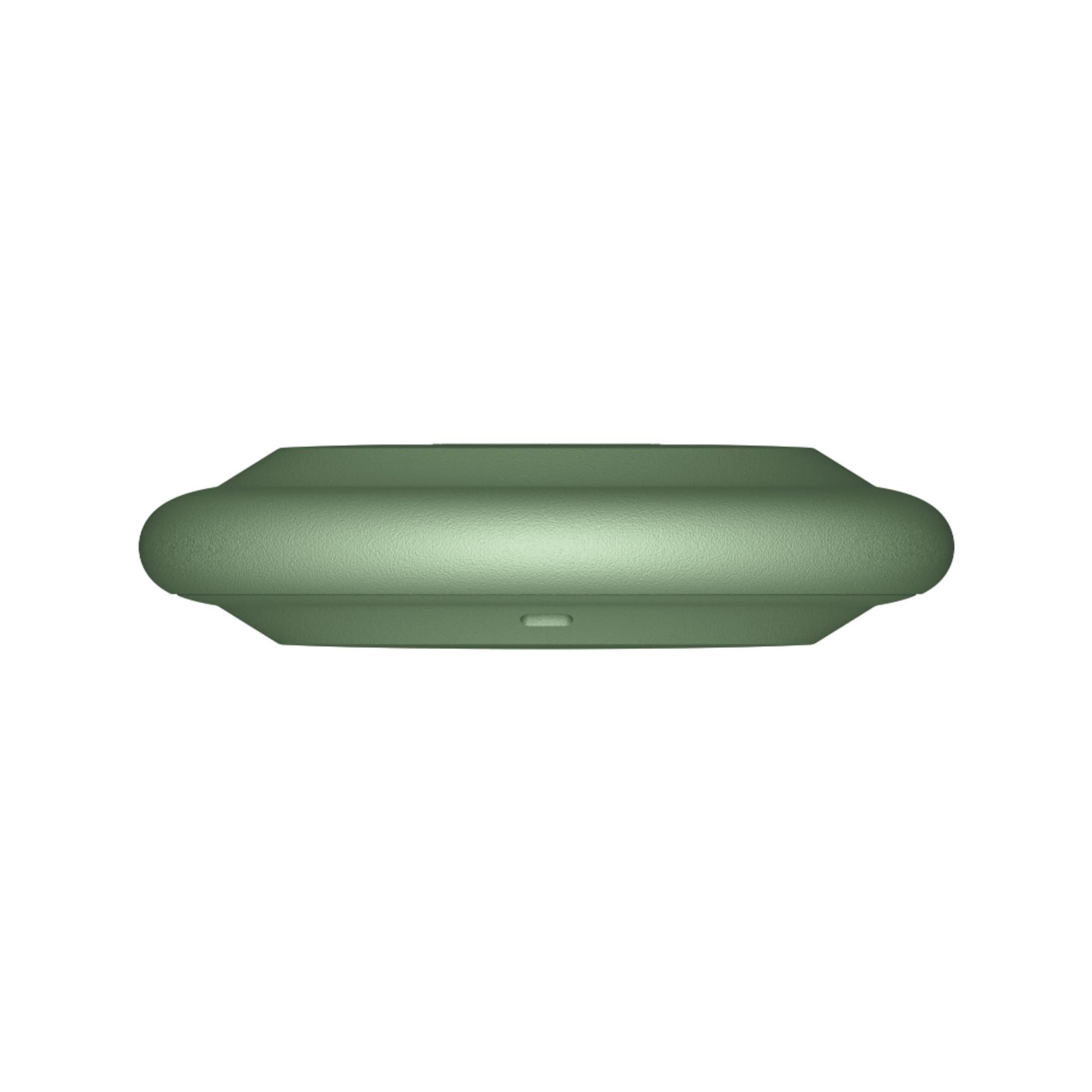 Un dispositivo redondo y verde con un pequeño indicador en el frente sobre un fondo blanco.