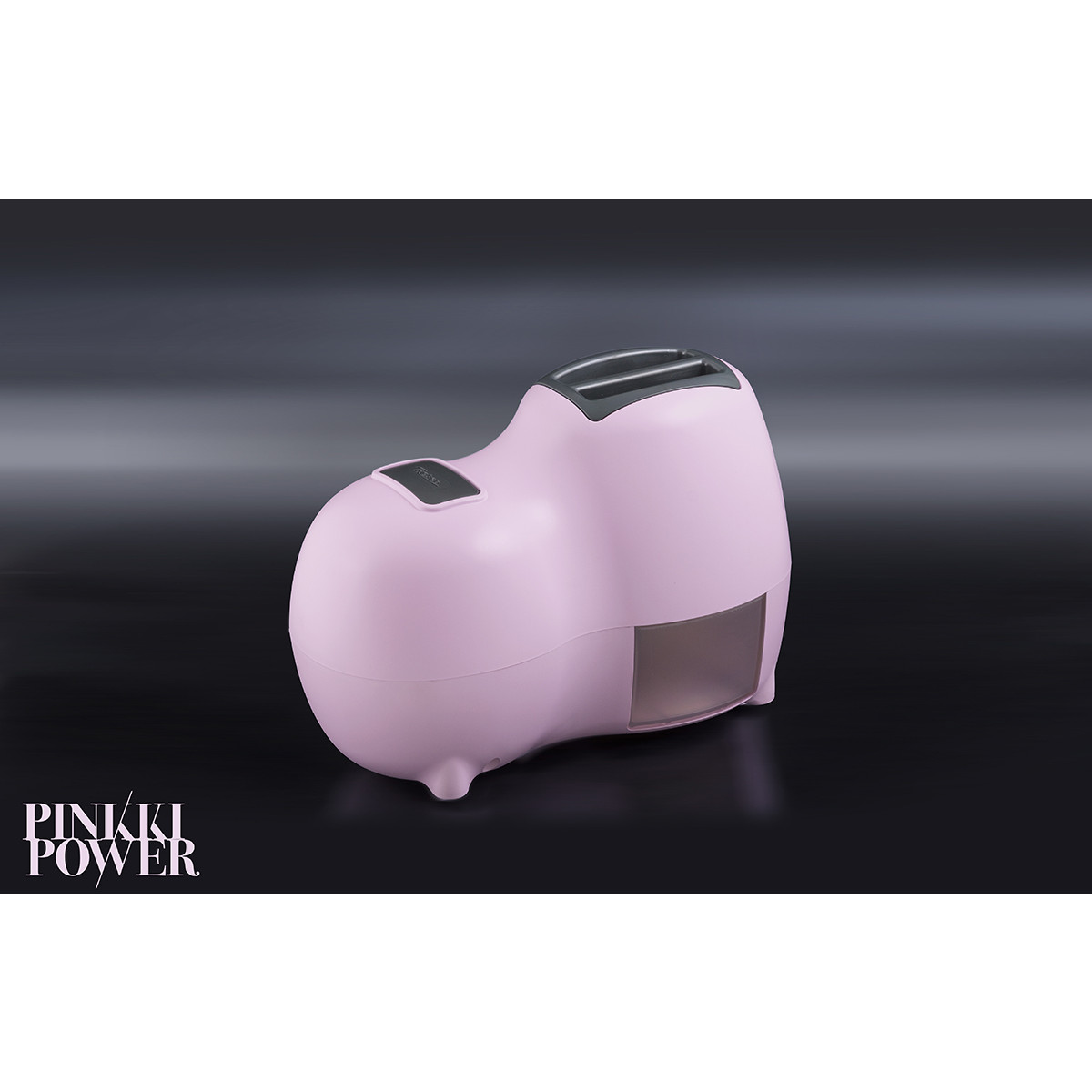 Un tostapane rosa dal design arrotondato su una superficie grigio scuro su sfondo scuro.
