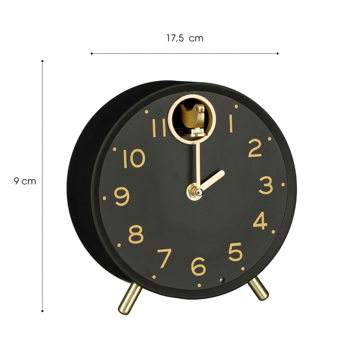 Eine schwarze, runde Tischuhr mit goldenen Ziffern, Zeigern und Beinen, 17,5 cm breit und 9 cm hoch.