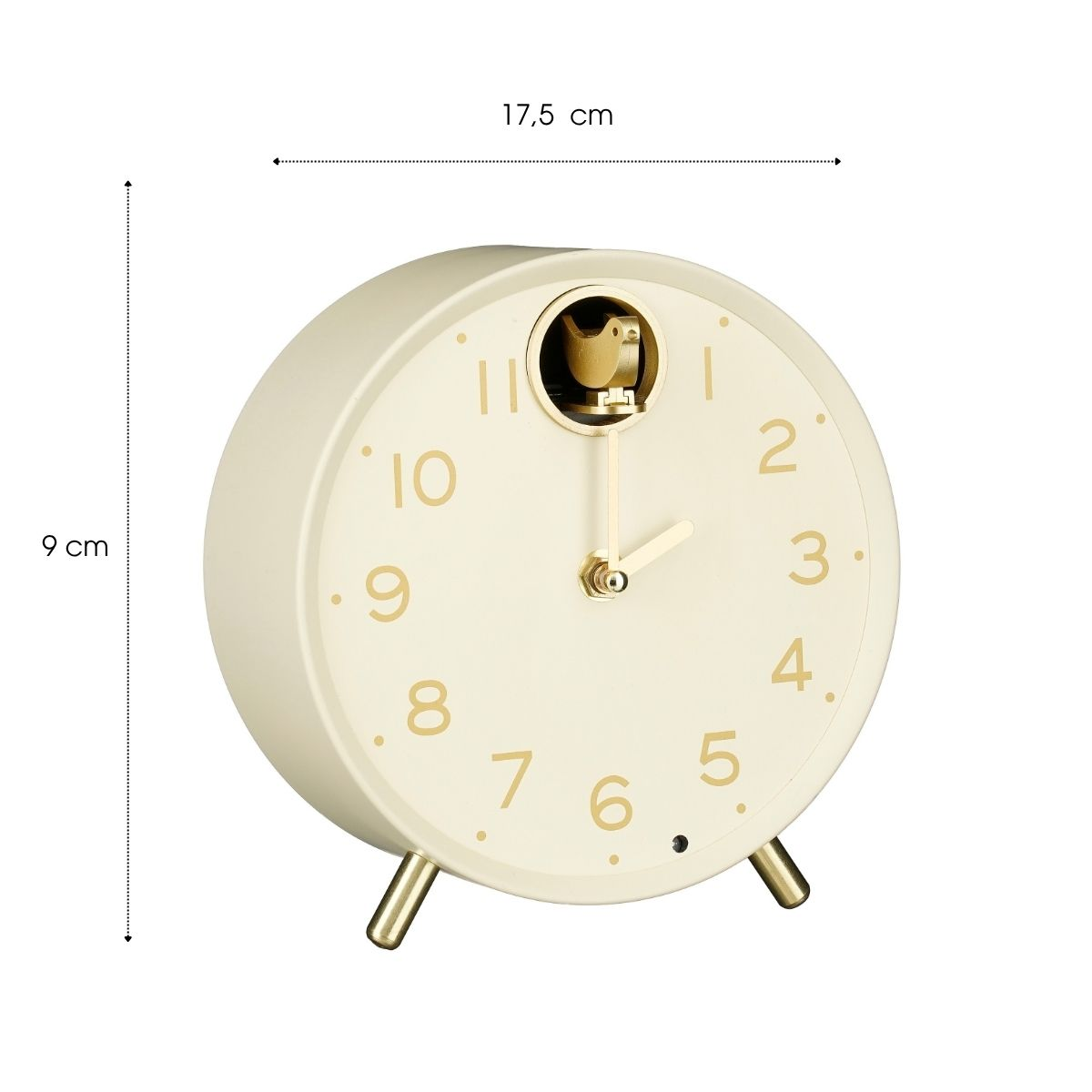Beige, runde Tischuhr mit goldener Zifferblattbeschriftung, Zeigern und einer kleinen Vogelfigur oben. Maße sind angegeben.