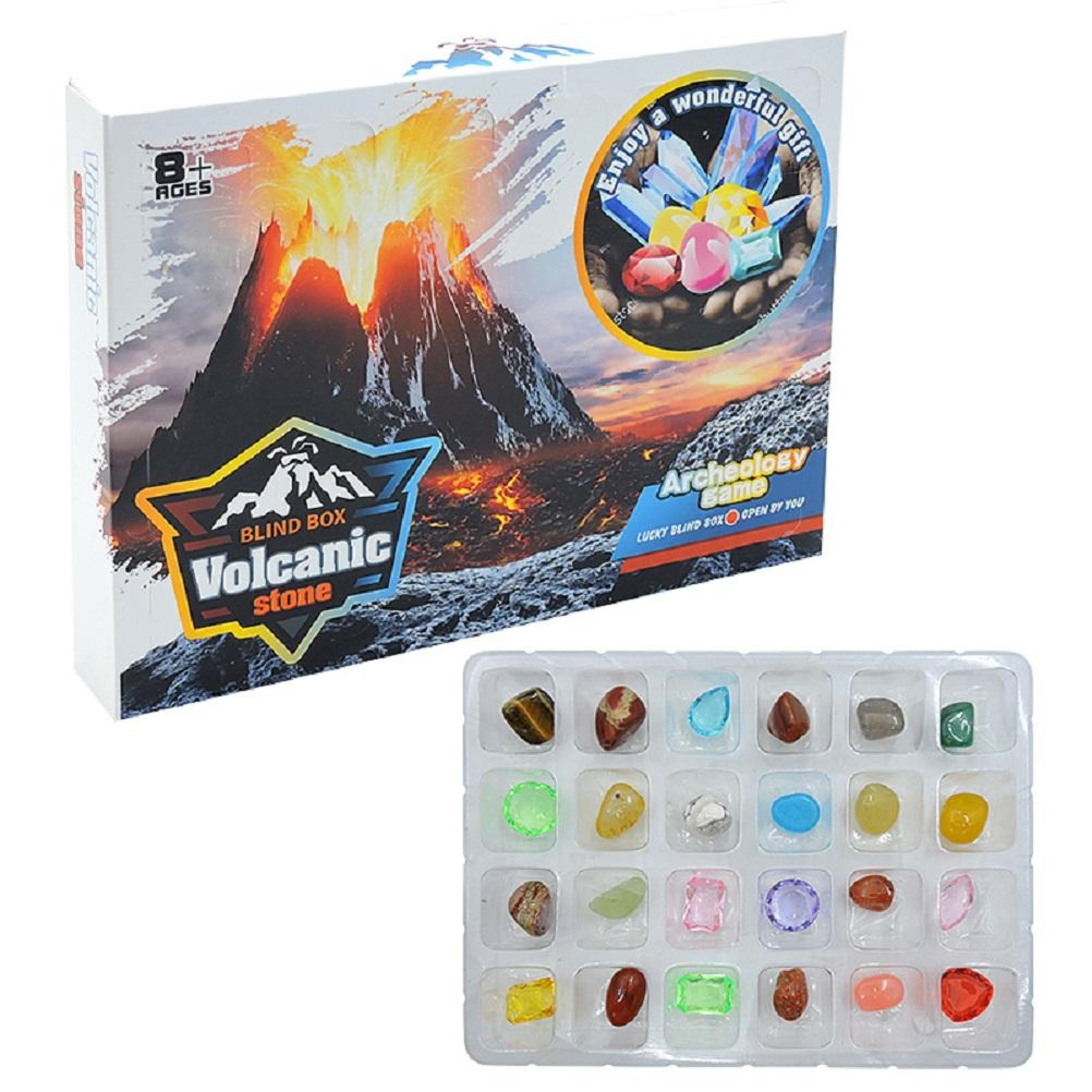 Verpackung eines Archäologie-Spiels mit Vulkanmotiv und Plastikschale voller bunter Edelsteine.