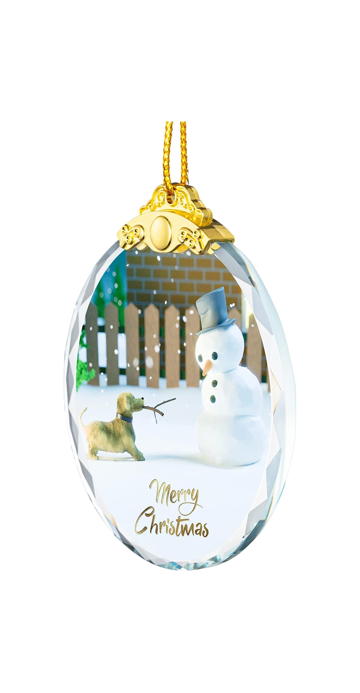 Ein kristallines Weihnachtszierstück mit einem Hund und Schneemann vor einem Zaun und der Inschrift Merry Christmas.