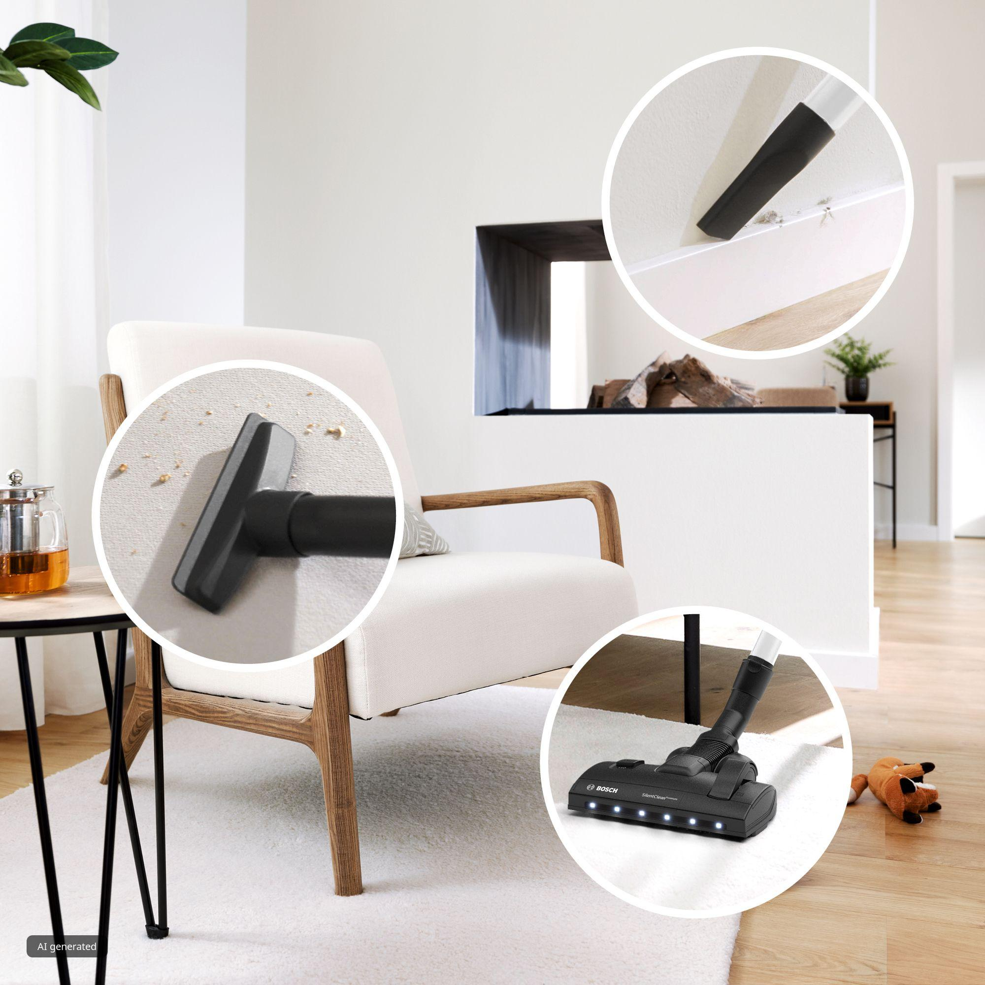 Stofzuiger in een moderne woonkamer met inlays die verschillende accessoires tonen.