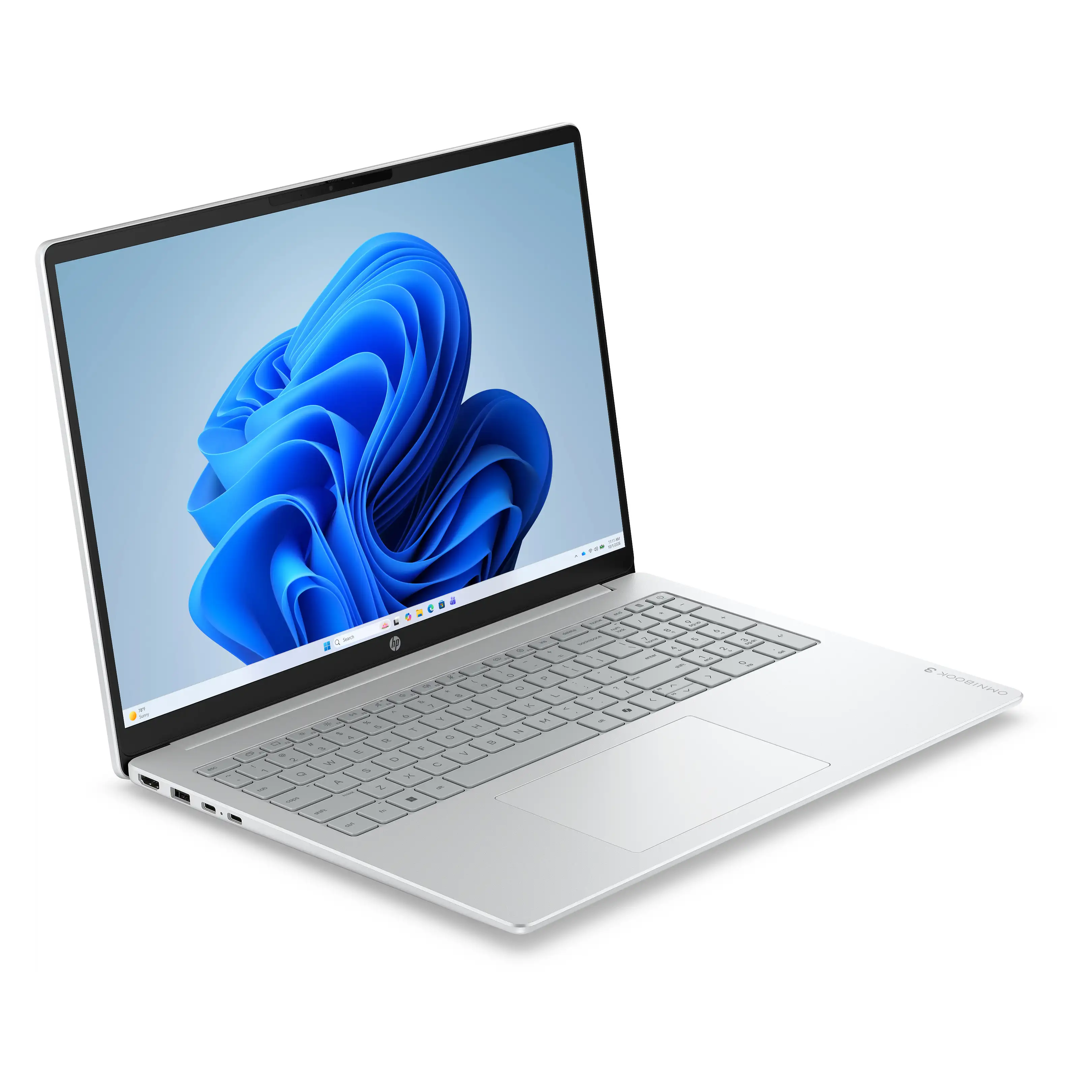 Un computer portatile argentato con uno sfondo astratto blu sullo schermo, visto da una prospettiva di tre quarti.