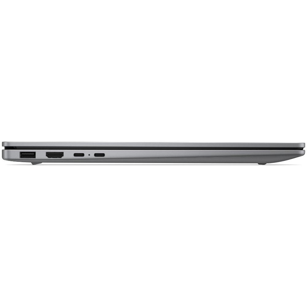 Vista laterale di un laptop grigio con porte USB e HDMI su sfondo bianco.