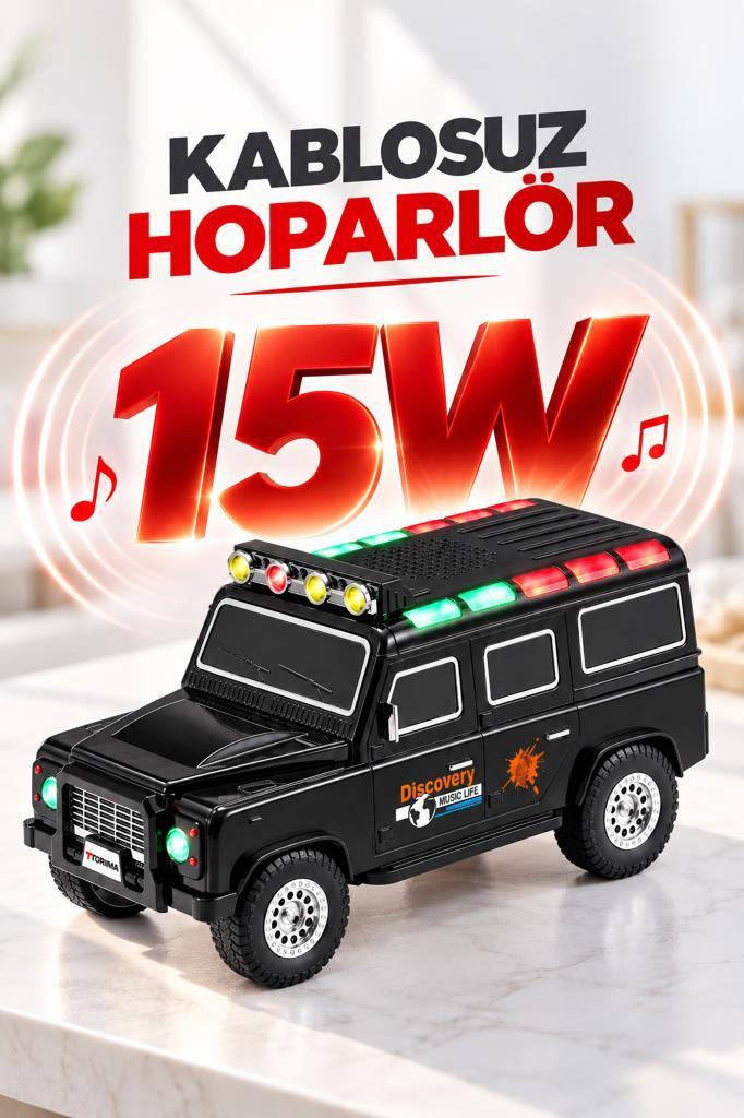 Siyah renkli, arazi aracı şeklinde, kırmızı ve yeşil ışıklı 15W kablosuz hoparlör.