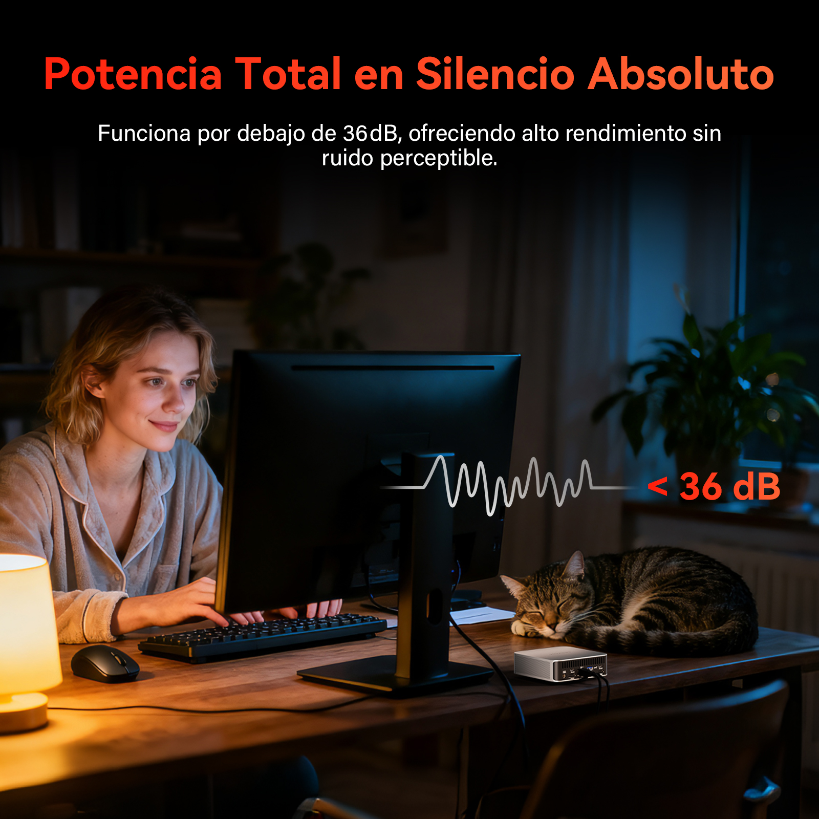 Mujer trabajando en ordenador de noche con un gato durmiendo plácidamente al lado, bajo 36 dB.