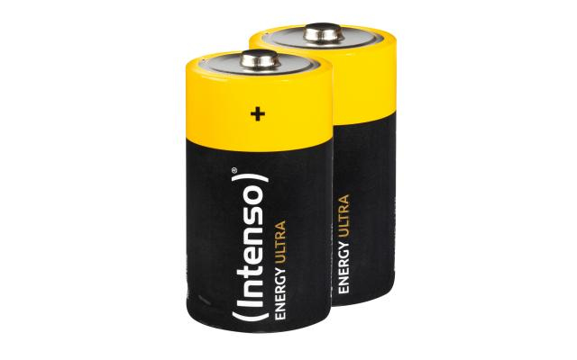 Deux piles C Intenso Energy Ultra noires et jaunes debout sur fond blanc.