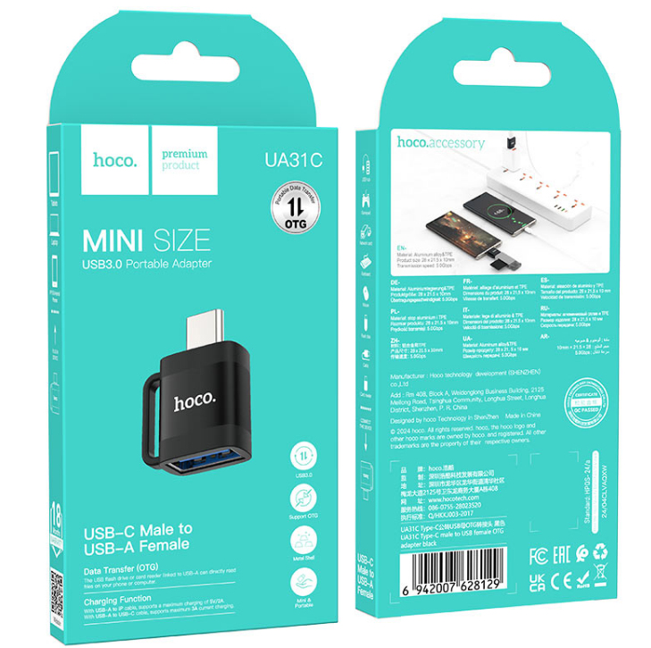 Türkisblaue Verpackung eines schwarzen USB-C auf USB-A Adapters mit Technischen Details und Hoco-Logo.