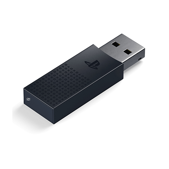 Un adaptador USB de PlayStation negro con el logotipo y los símbolos de los botones típicos sobre fondo blanco.