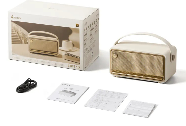 Beżowo-złoty głośnik Bluetooth Edifier MP330 z pudełkiem, kablem i instrukcjami na białym tle.