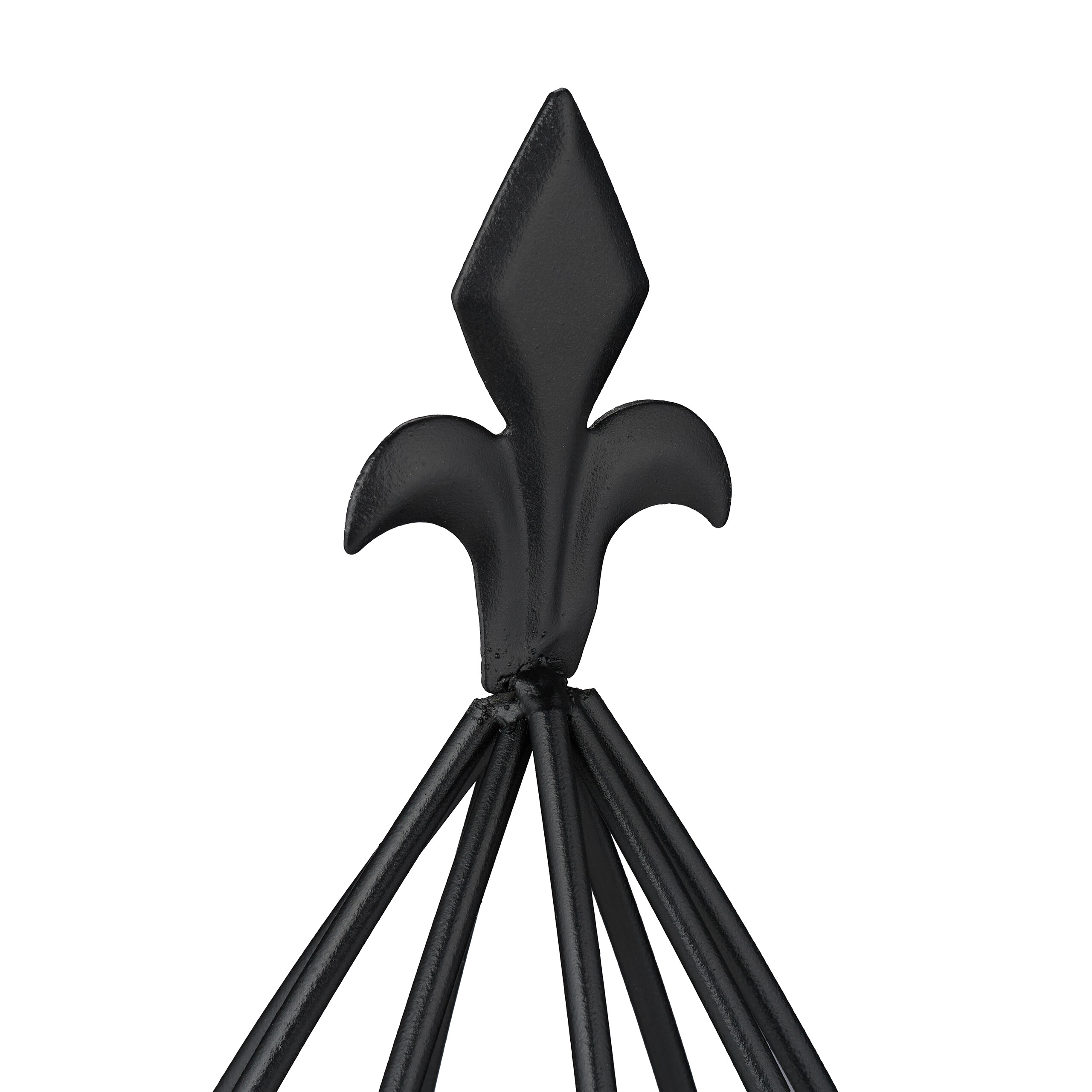 Schwarze metallene Lilien-Spitze auf einem Zaun oder Gitter vor weißem Hintergrund.