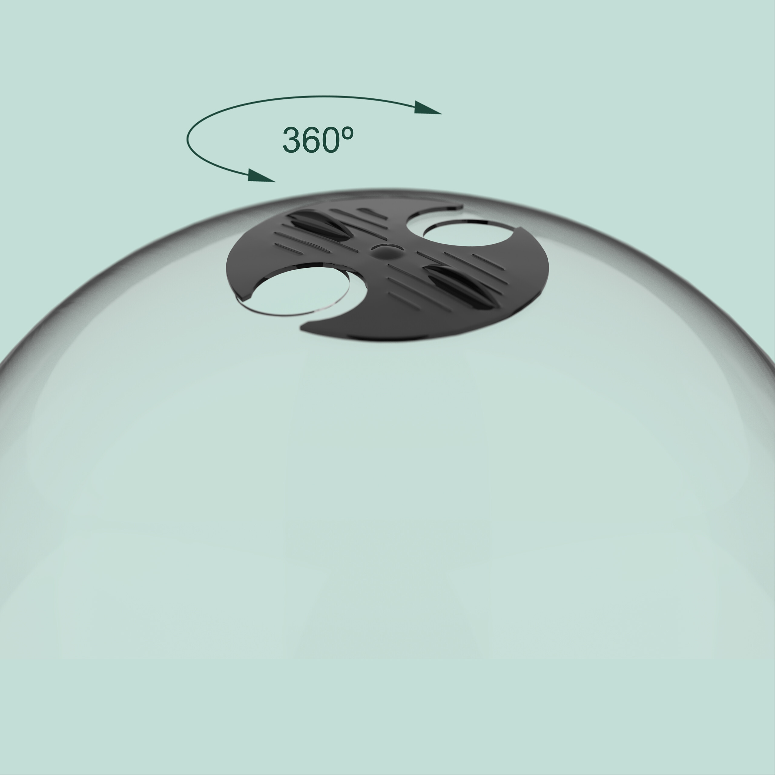Eine schwarze kreisförmige Entlüftung auf einer gewölbten, durchscheinenden Oberfläche mit einem 360-Grad-Pfeil.