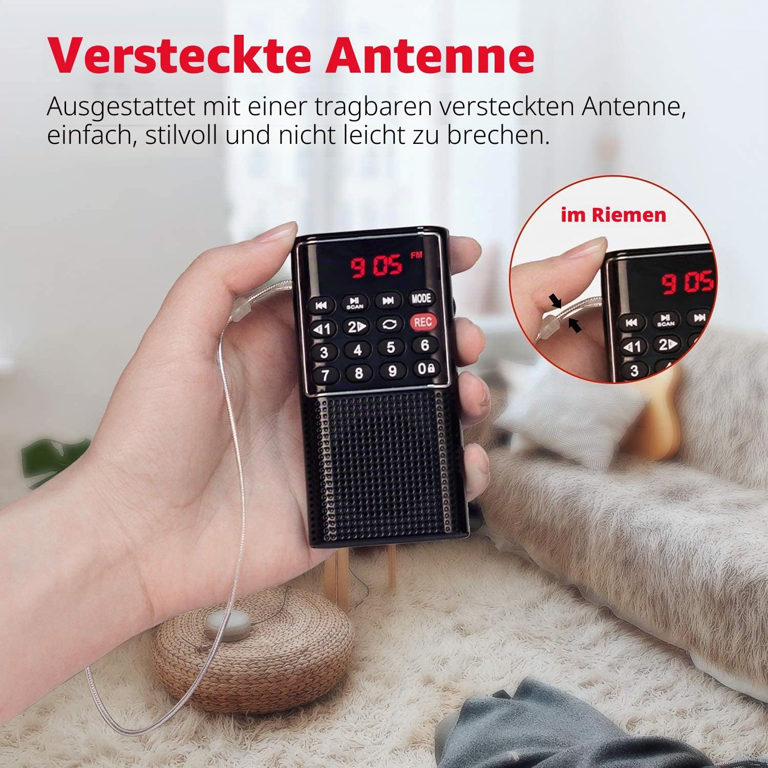 Hand hält ein kleines schwarzes Radio mit digitaler Anzeige und versteckter Antenne am Band.