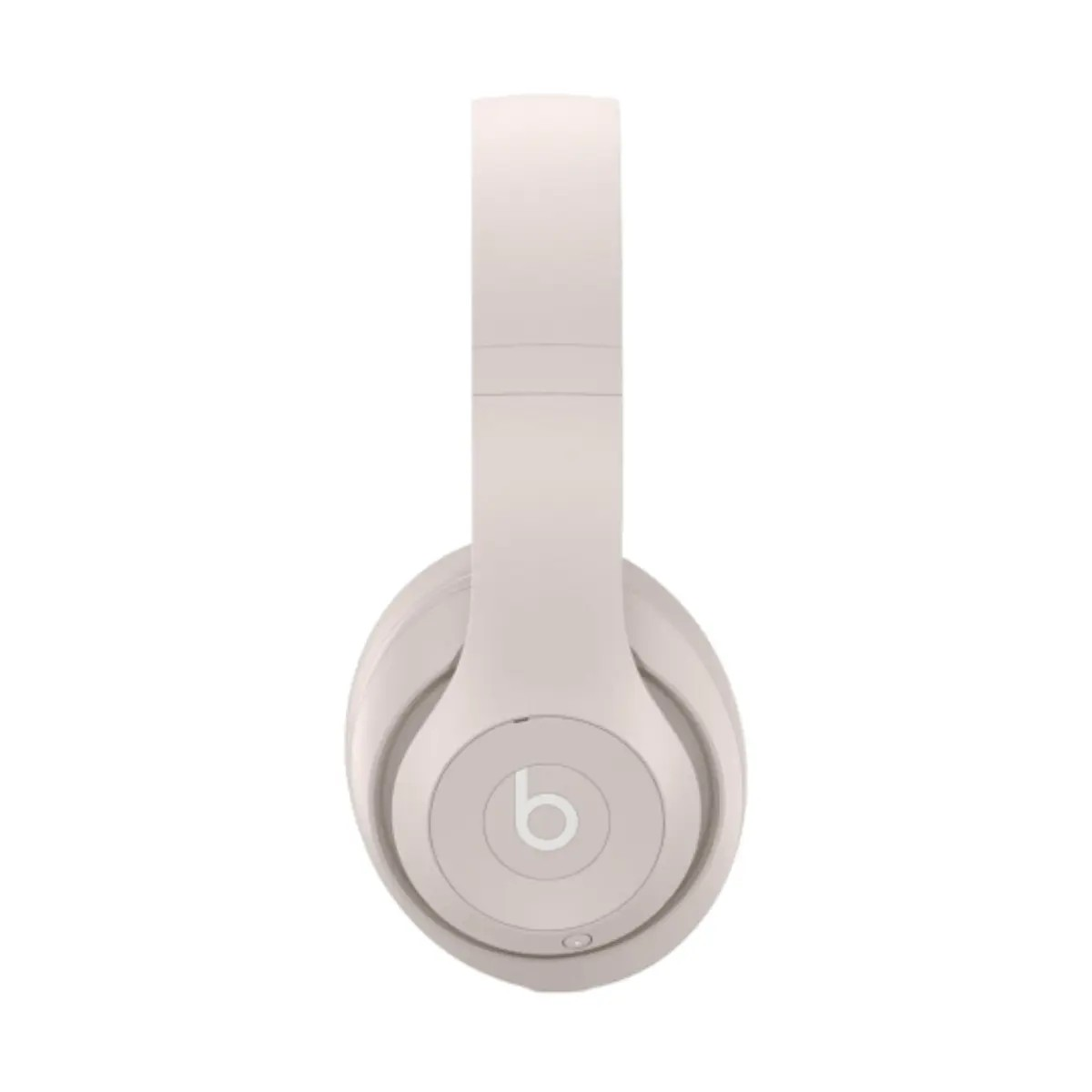 Un paio di cuffie bianche Beats sono mostrate di lato su sfondo bianco.