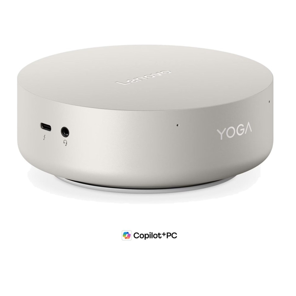 Srebrny, okrągły komputer Lenovo Yoga z portami USB-C i audio na białym tle.