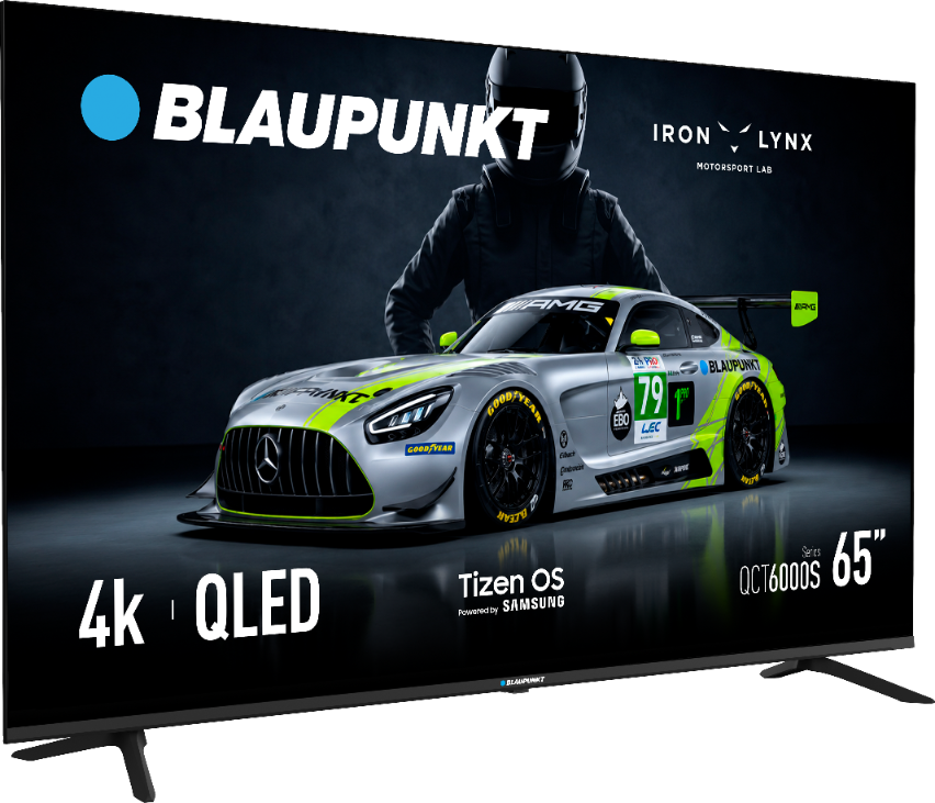 Telewizor Blaupunkt 4K QLED z samochodem wyścigowym i tekstem na ekranie.