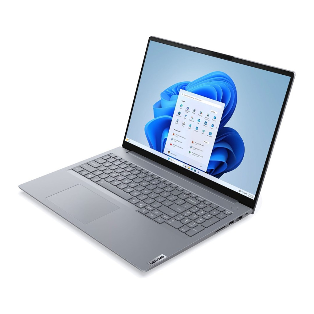 Srebrny laptop z otwartym ekranem wyświetla niebieską abstrakcyjną tapetę i interfejs systemu operacyjnego Windows.