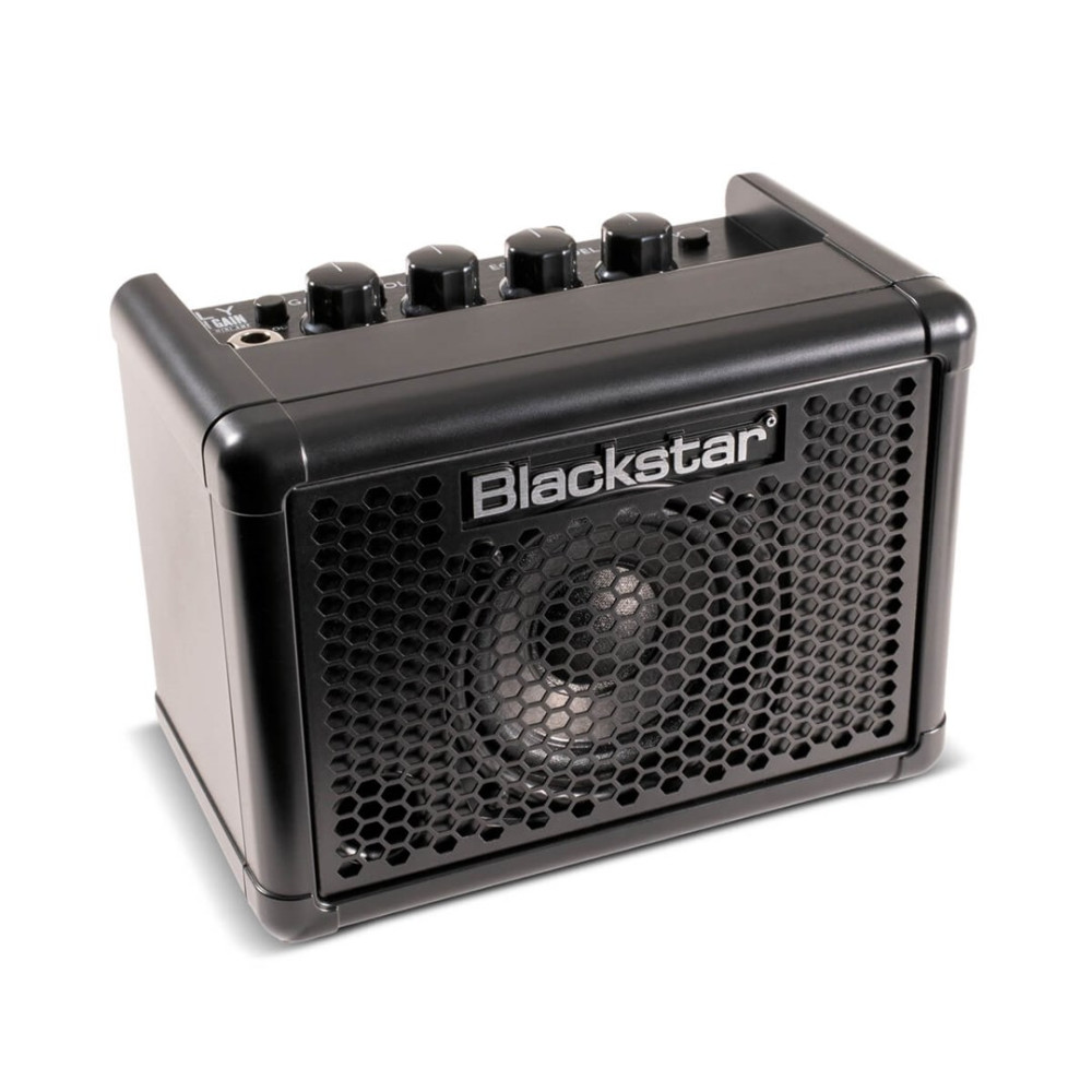 Kompaktowy czarny wzmacniacz gitarowy Blackstar z siatką w kształcie plastra miodu i pokrętłami na białym tle.