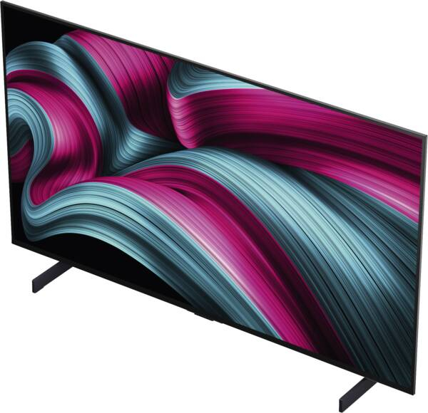 Ein moderner Flachbildfernseher auf Standfüßen zeigt eine abstrakte pink-blaue Grafik.