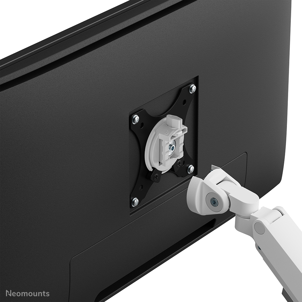 Arrière d'un moniteur noir avec support VESA monté, bras blanc à proximité.