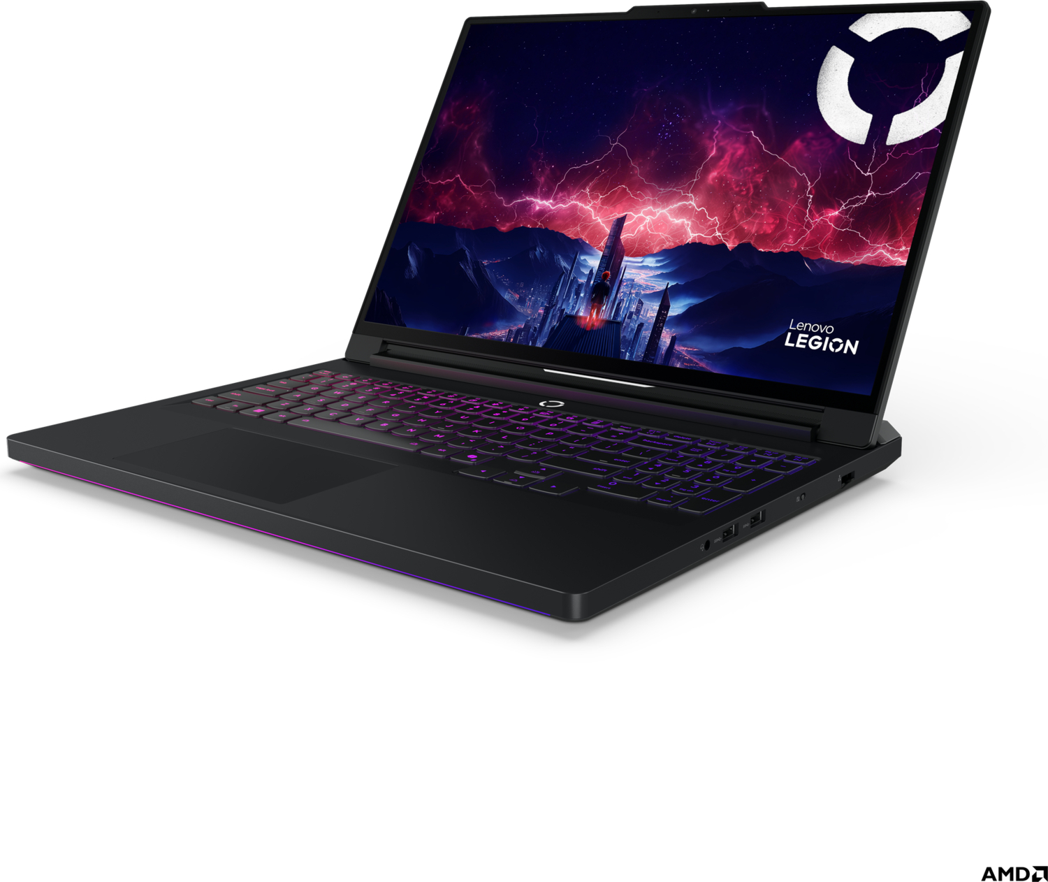 Arkadan aydınlatmalı klavyeye ve mor fırtınalı gökyüzü altındaki bir şehri gösteren ekrana sahip siyah bir Lenovo Legion dizüstü bilgisayar.