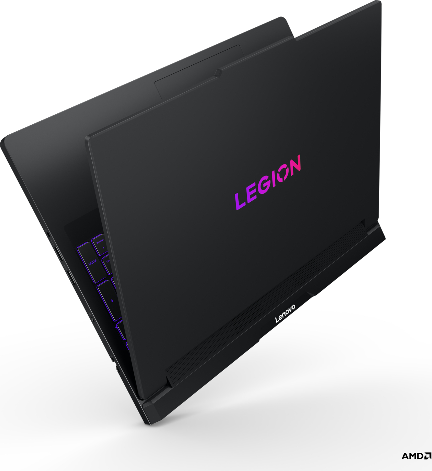 Işıklı klavyeli ve pembe logolu siyah bir Lenovo Legion oyuncu dizüstü bilgisayarı.