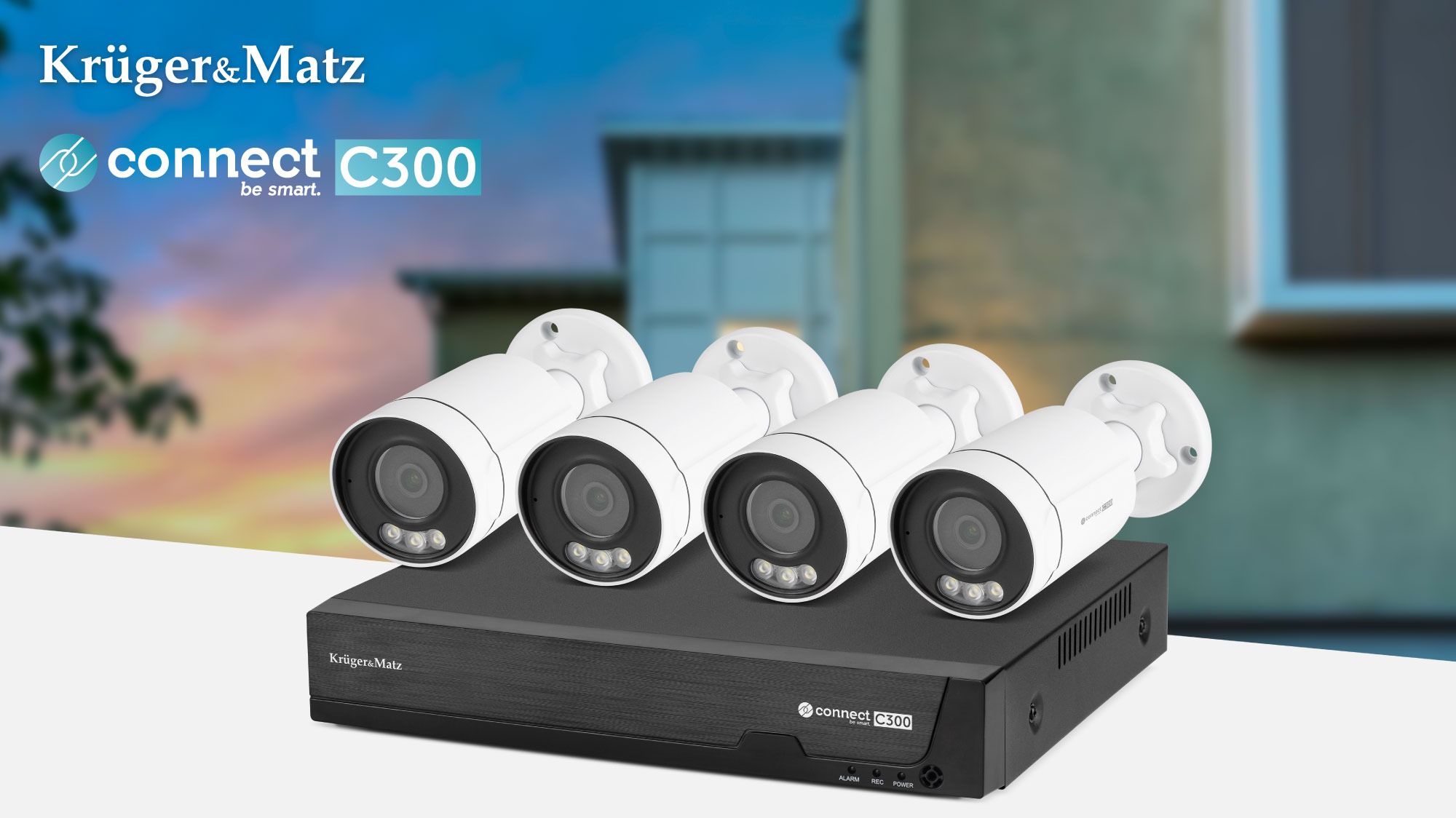 Cztery biale kamery bezpiecznictwa na czarnym rejestratorze DVR.