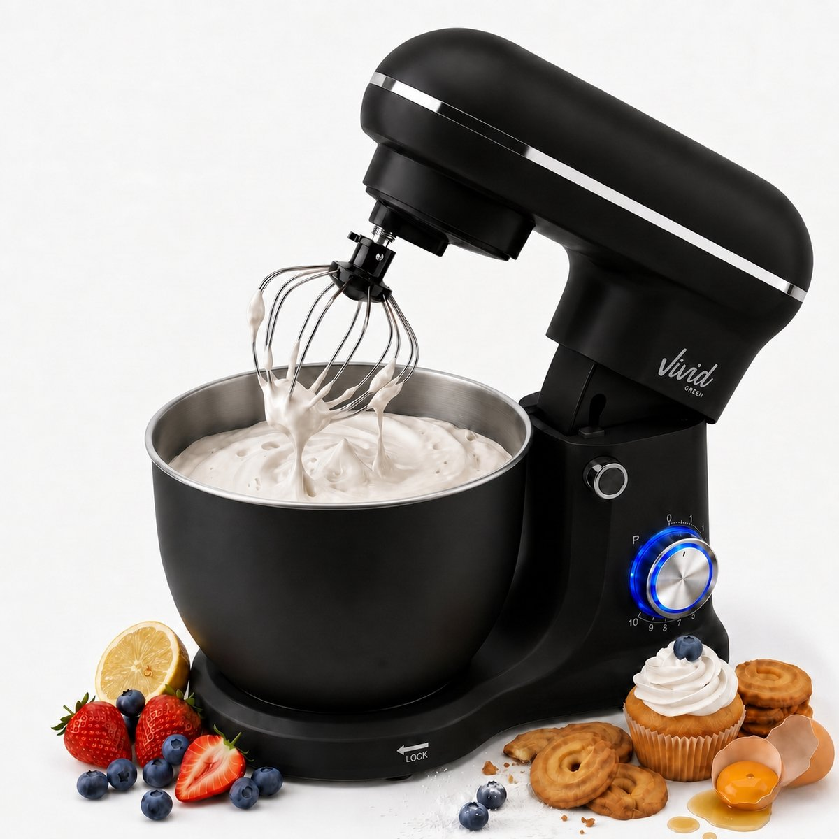 A black stand mixer mixing batter in a steel bowl, surrounded by strawberries, blueberries, a lemon, cookies, and eggs.