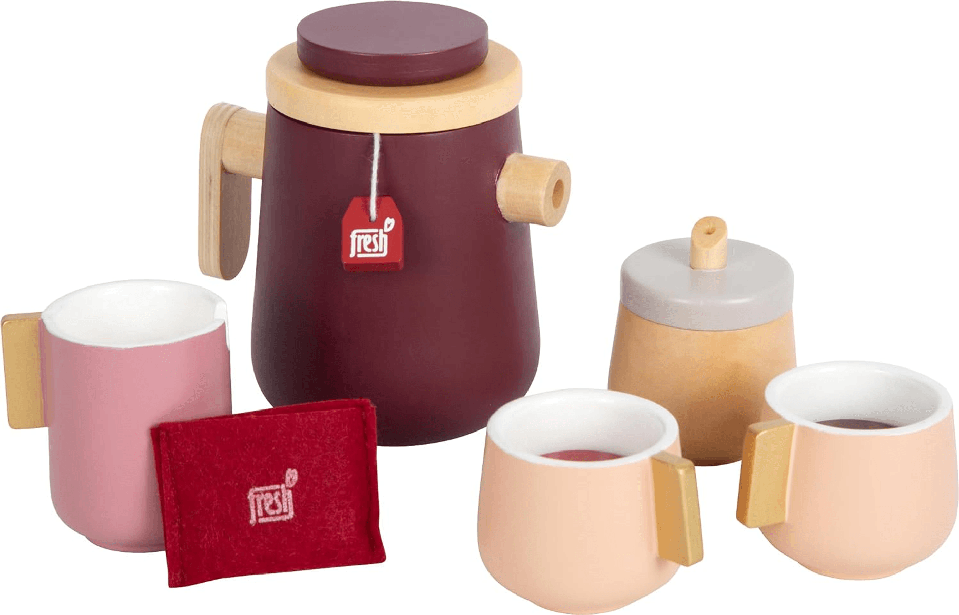 Un juego de té de madera con una tetera rojo oscuro, dos tazas, una lechera, un azucarero y una bolsa de té.