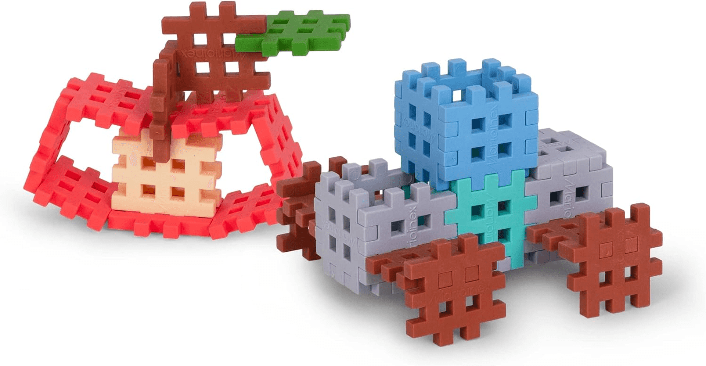 Bloques de construcción de plástico de colores forman una manzana roja y un vehículo.