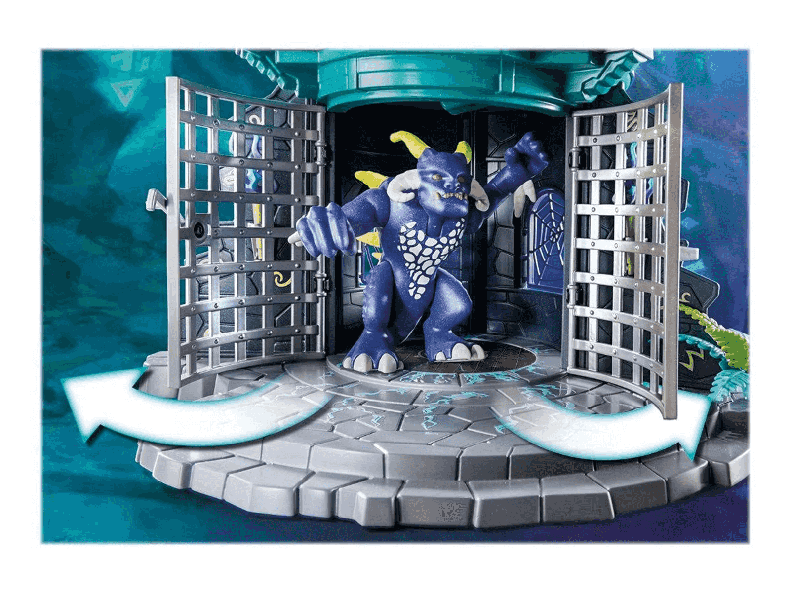 Eine blaue Monsterfigur steht in einem grauen Steingefängnis mit offenen Toren.