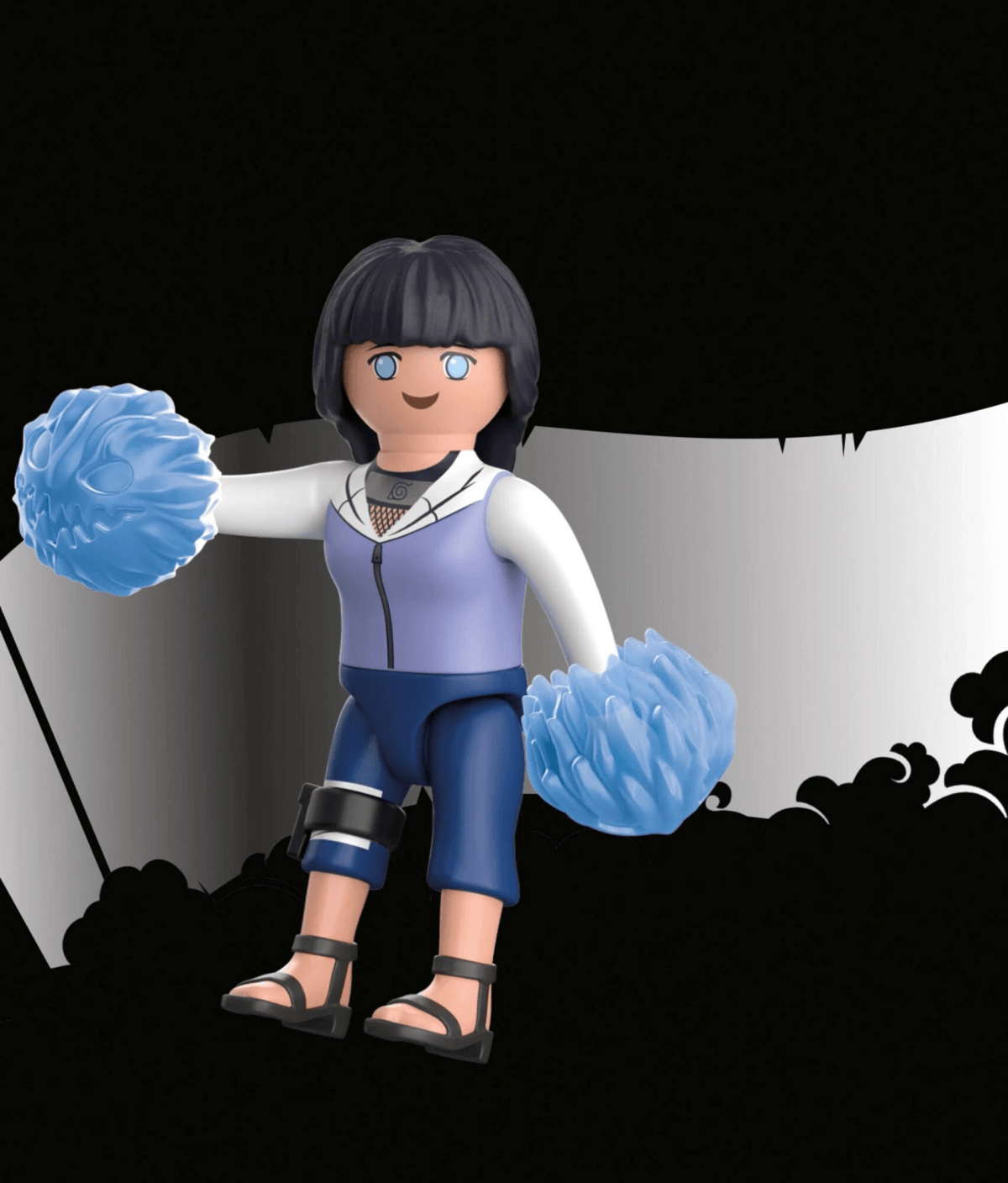 Playmobil-Figur im Naruto-Stil hält blaue Bommel vor schwarz-weißem Hintergrund.