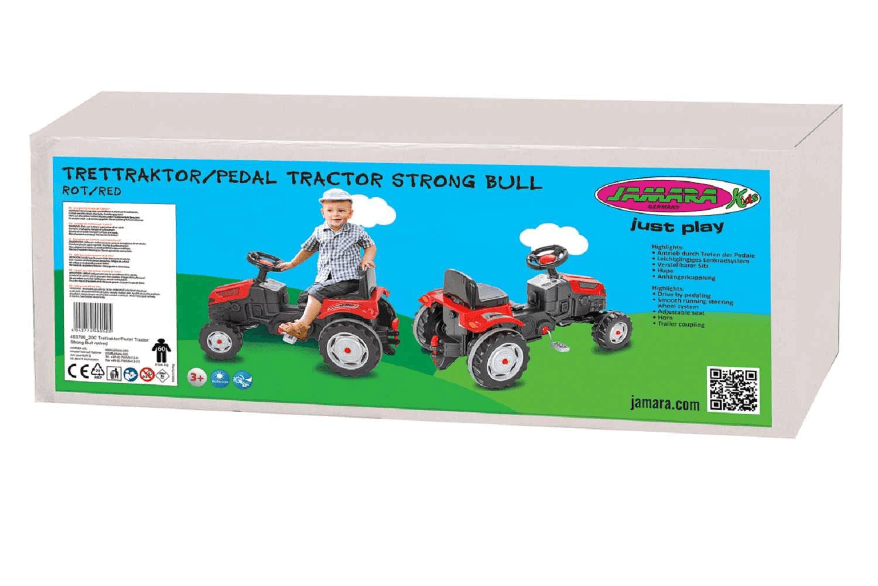 Verpackungskarton für einen roten Jamara Kids Trettraktor mit einem Kind, das darauf sitzt.
