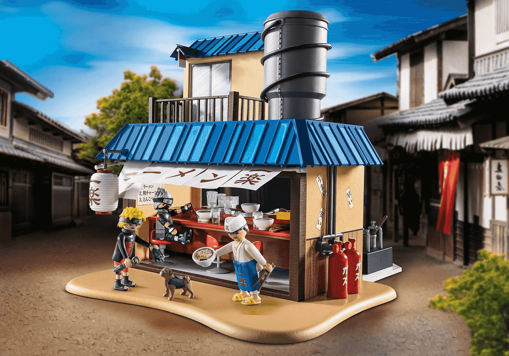 Set de tienda de ramen anime de Playmobil con figuras, un perro pequeño y accesorios de cocina en una calle.