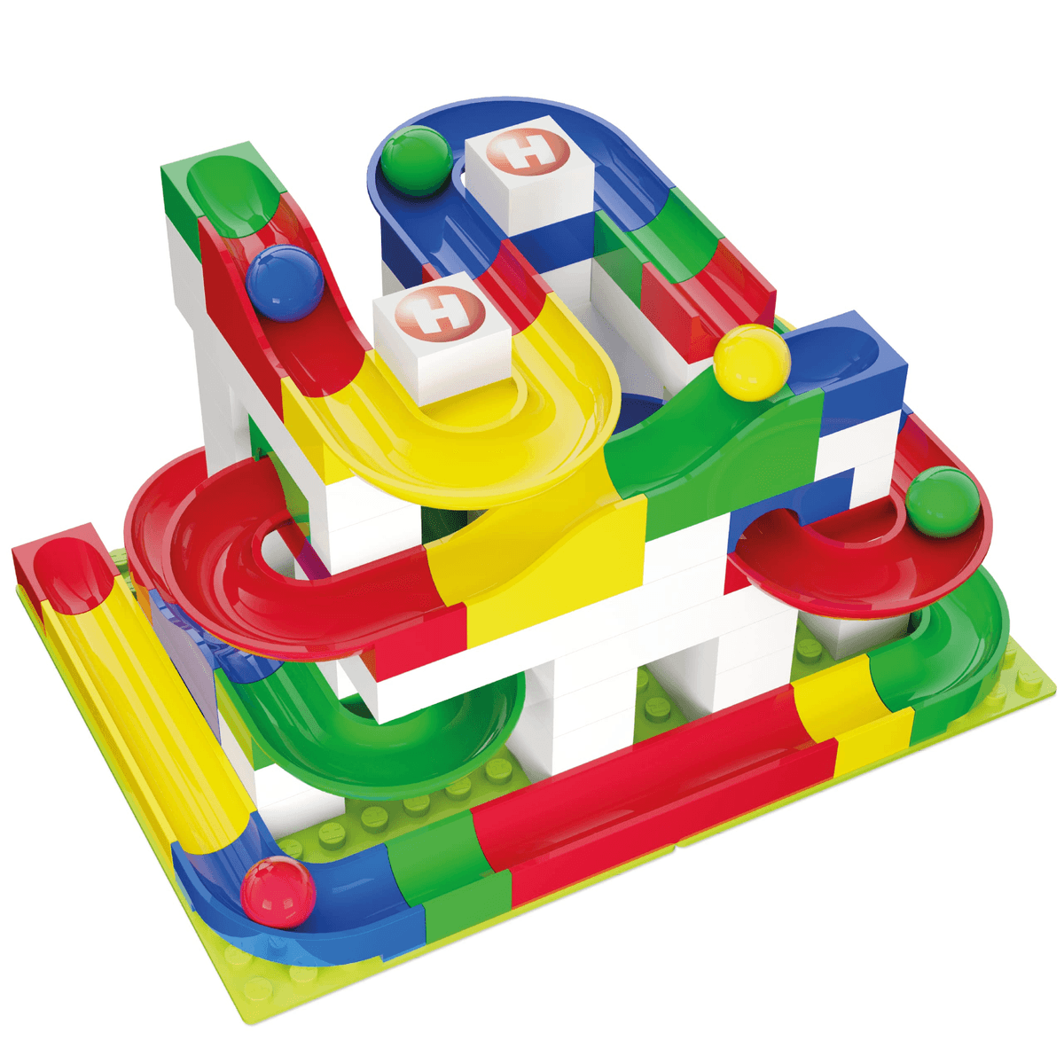 Un colorido circuito de canicas de plástico en una base verde, con múltiples pistas y bolas.