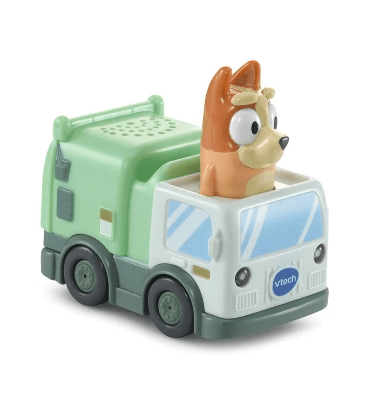 Un camión de basura de juguete VTech verde y blanco con una figura de perro azul en la cabina, sobre fondo blanco.