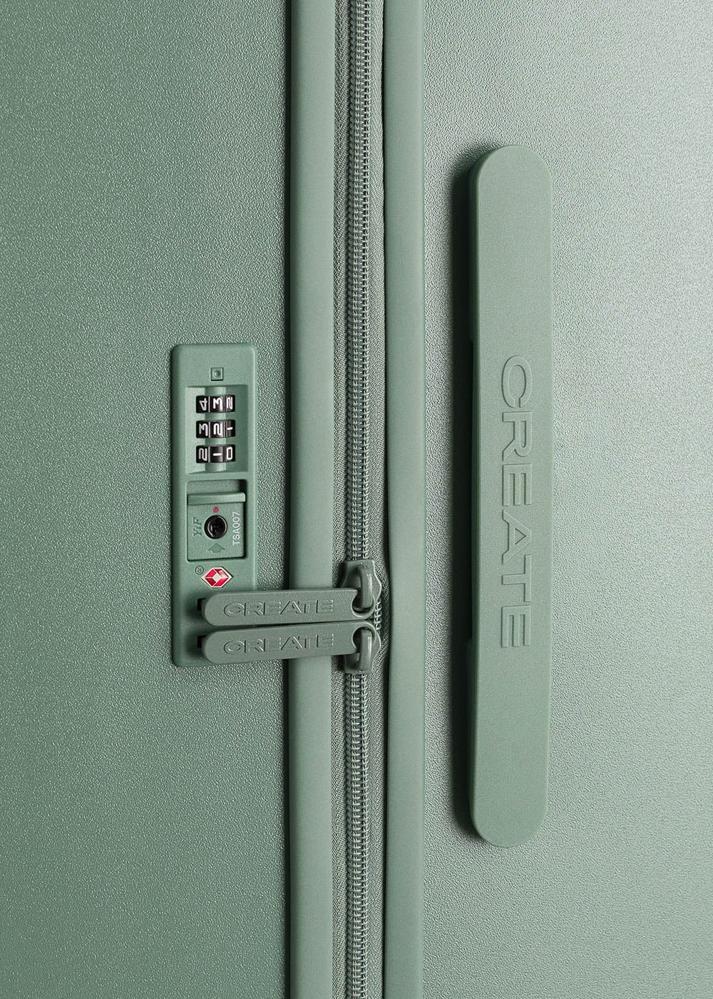 Maleta verde con cerradura de combinación, cremallera y asa integrada con la marca CREATE.
