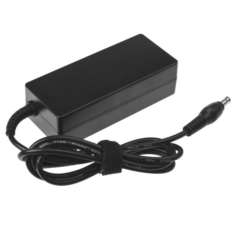 Ein schwarzes Netzteil mit aufgerolltem Kabel und zylindrischem Stecker.