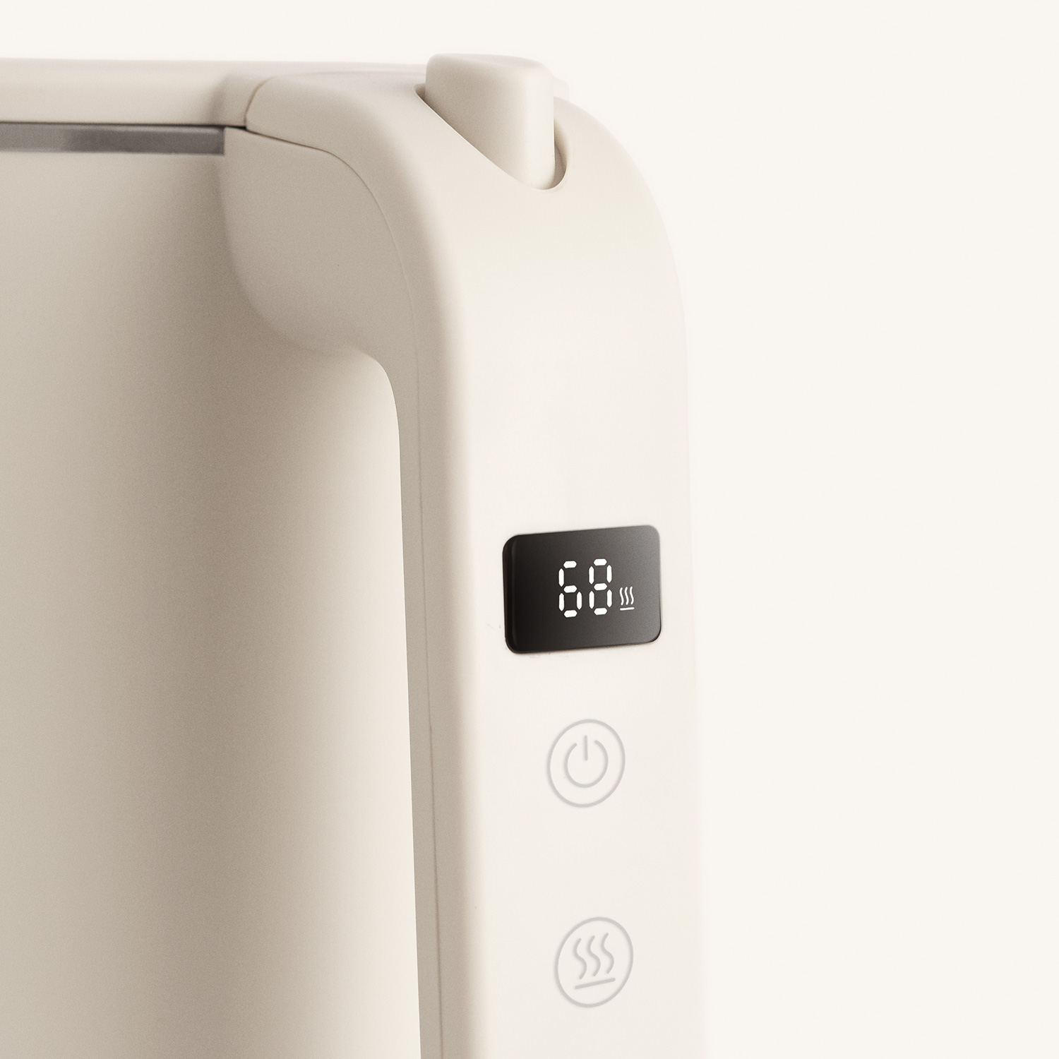 Primer plano del mango de un hervidor eléctrico beige con pantalla de temperatura digital y botones táctiles.