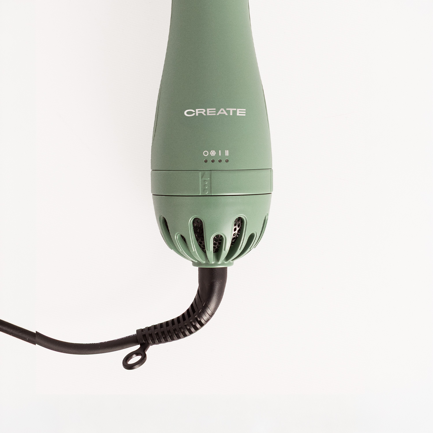Un secador de pelo verde Create con rejillas de ventilación y un cable negro sobre fondo blanco.