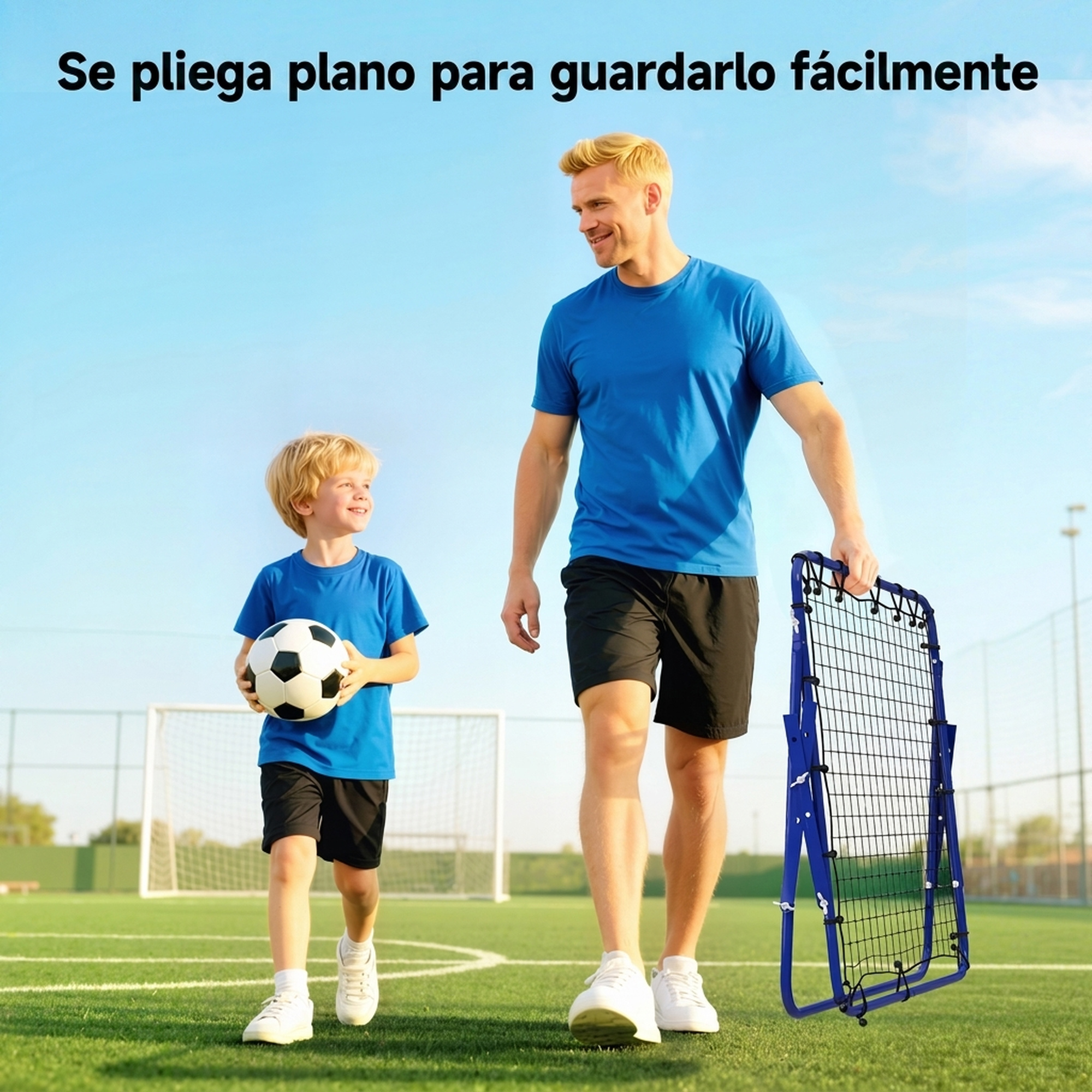 Padre e hijo con camisetas azules caminan por un campo de fútbol; el padre lleva una red de rebote plegable.