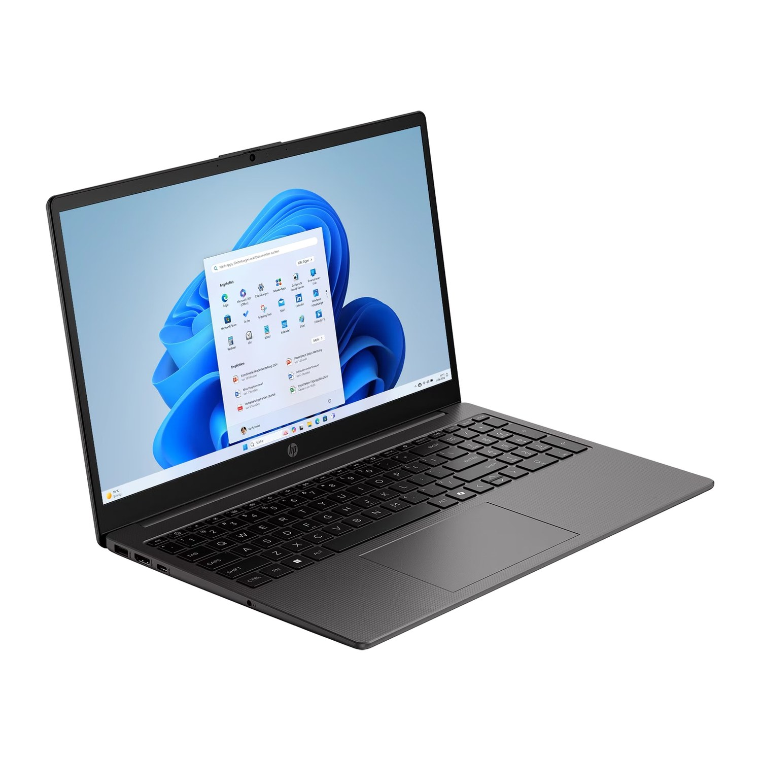 Ein offener schwarzer HP Laptop zeigt den Windows-Desktop mit einem blauen Hintergrundbild und der geöffneten Startleiste.